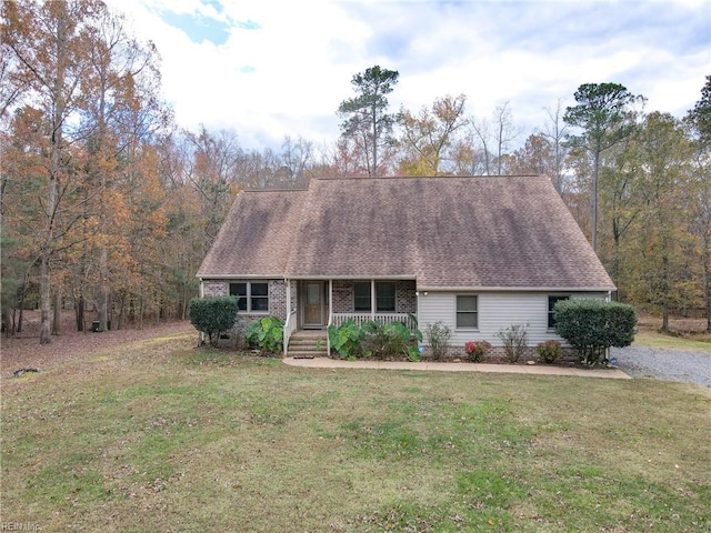 view of front of house with a front lawn and covered porch