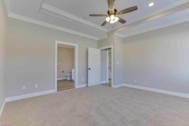 unfurnished room with crown molding, ceiling fan, and light colored carpet