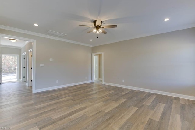 unfurnished room featuring crown molding, ceiling fan, and light hardwood / wood-style floors