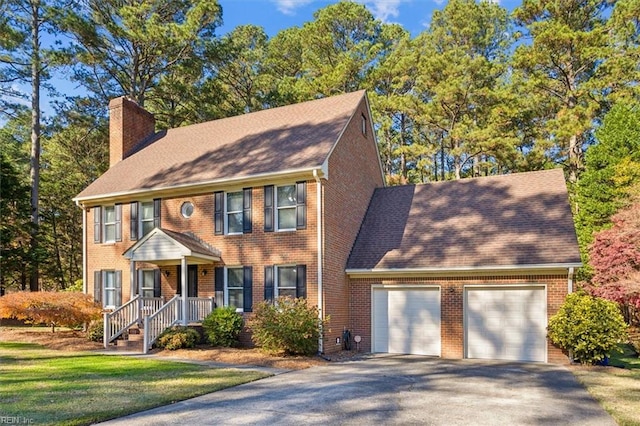 colonial home featuring a garage