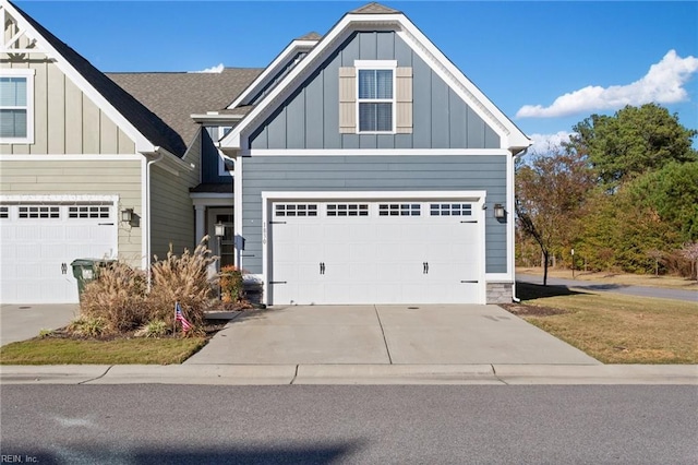 craftsman house with a garage