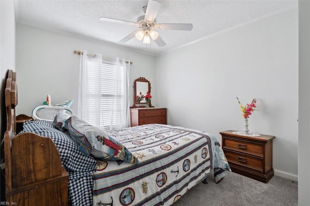 carpeted bedroom featuring ceiling fan and a textured ceiling