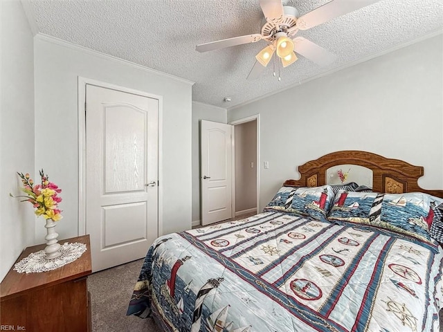 carpeted bedroom with ceiling fan, crown molding, and a textured ceiling