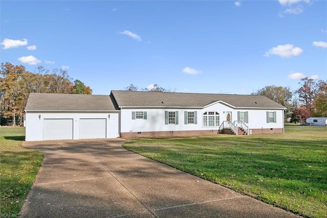 ranch-style home featuring a garage and a front yard