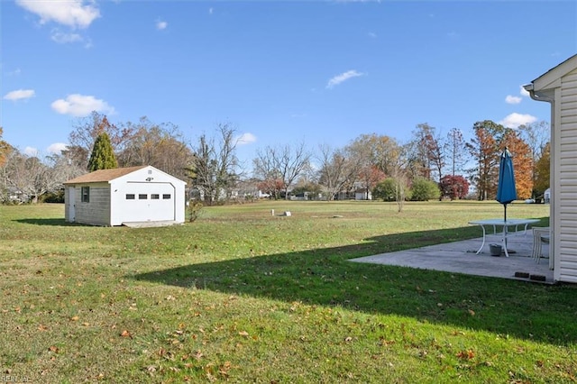 view of yard with a patio area and a storage shed