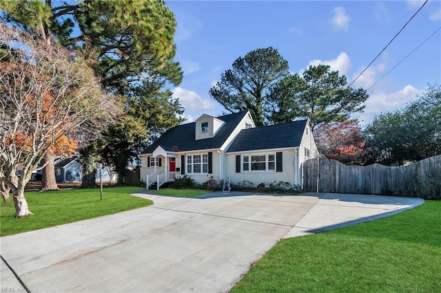 cape cod house featuring a front lawn