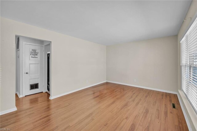 empty room featuring light hardwood / wood-style floors