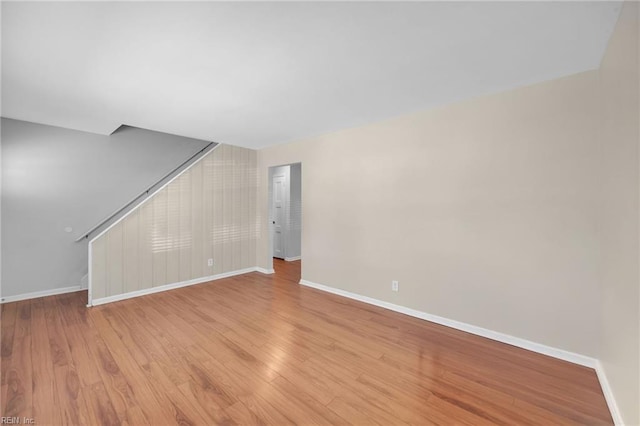 unfurnished room with light hardwood / wood-style flooring