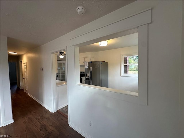 corridor with dark wood-type flooring