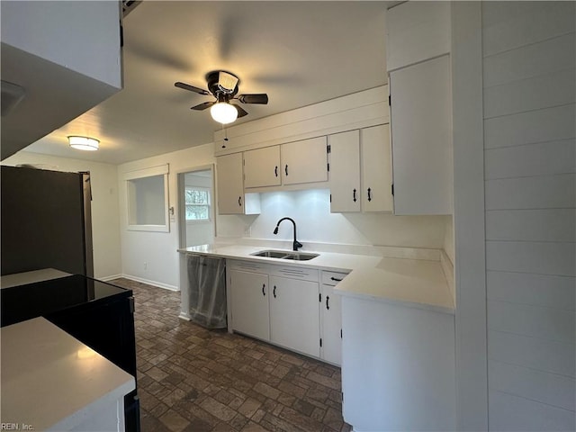 kitchen with white cabinetry, sink, ceiling fan, and appliances with stainless steel finishes