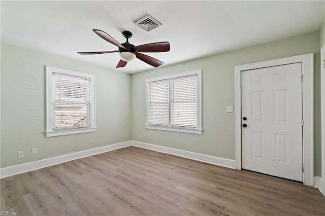 foyer featuring light wood-type flooring and ceiling fan