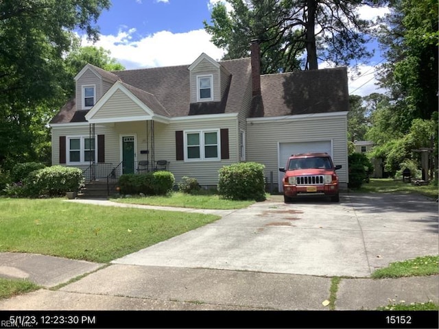 cape cod home with a garage and a front lawn