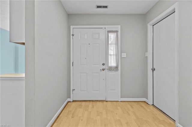 foyer entrance featuring light hardwood / wood-style floors