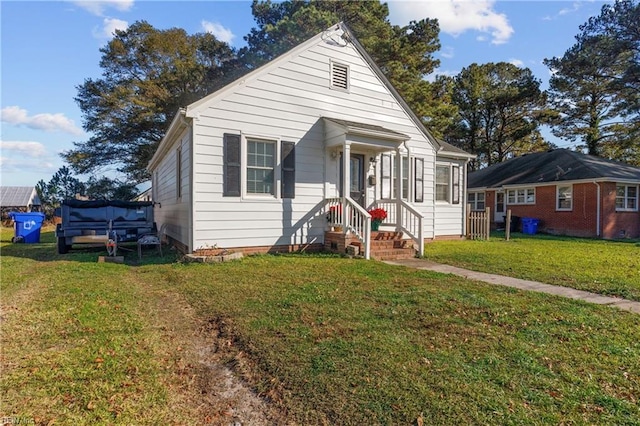 bungalow with a front yard