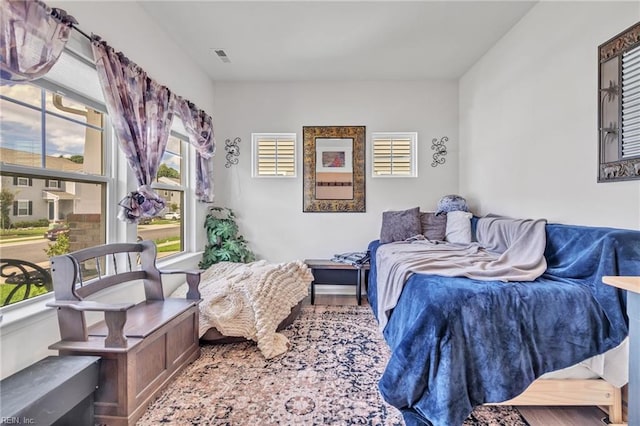 bedroom featuring hardwood / wood-style flooring