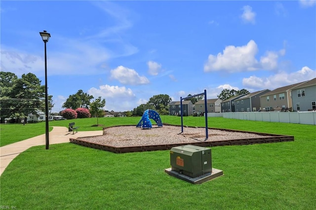 view of jungle gym with a lawn