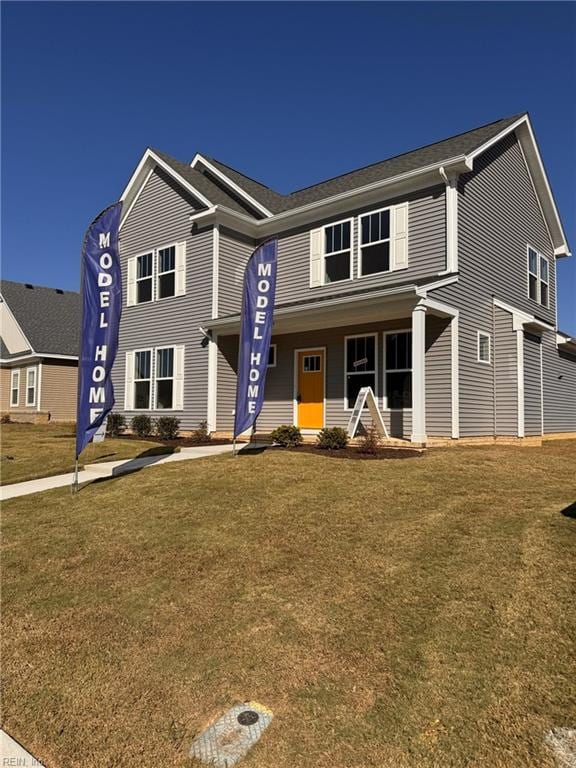 view of front facade featuring a front yard