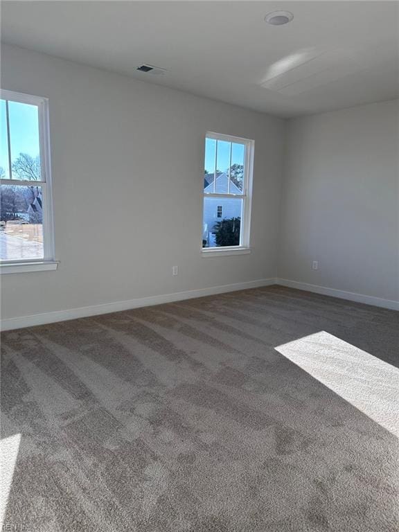 view of carpeted spare room