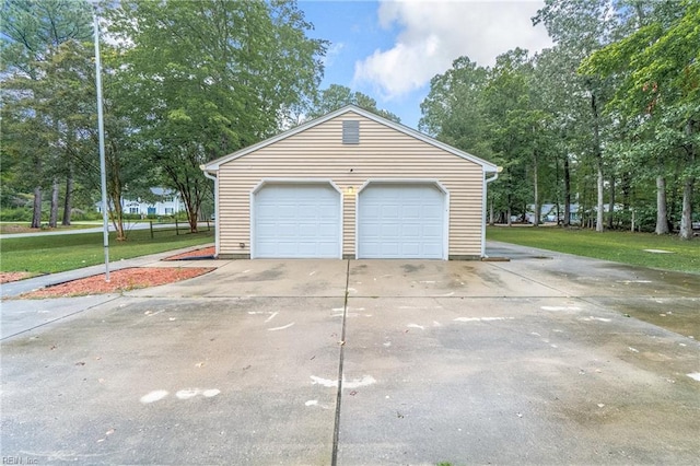 garage with a lawn