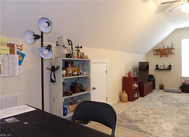 carpeted bedroom featuring ceiling fan and vaulted ceiling