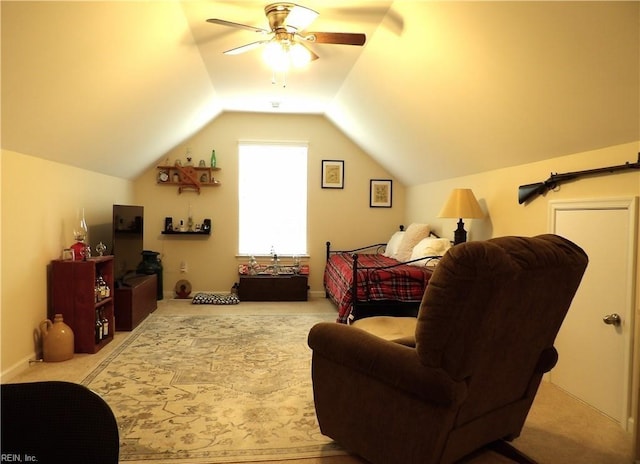 carpeted bedroom with ceiling fan and lofted ceiling