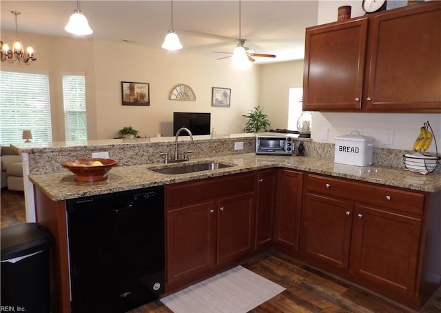 kitchen with sink, black dishwasher, decorative light fixtures, dark hardwood / wood-style flooring, and kitchen peninsula