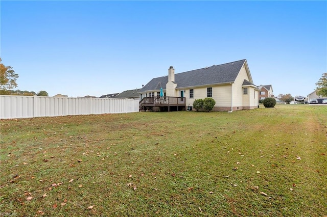 view of yard featuring a deck