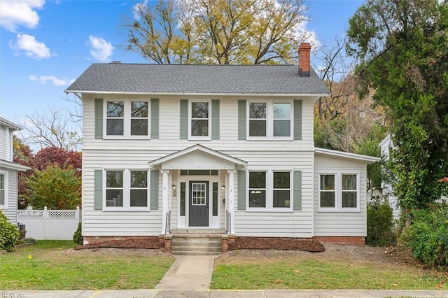 view of front of property with a front lawn