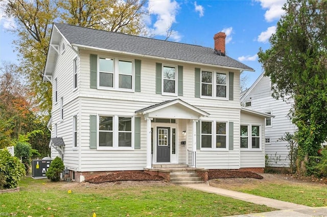 view of front facade with a front yard