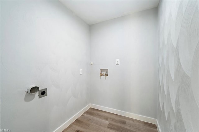 laundry room with washer hookup, electric dryer hookup, and hardwood / wood-style floors