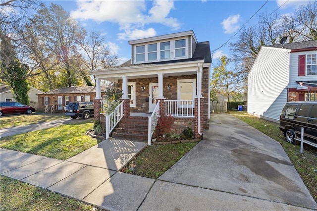 view of front of home featuring covered porch