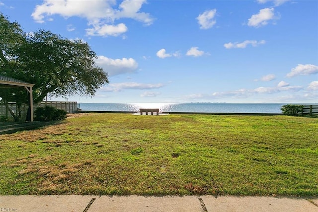 view of yard with a water view