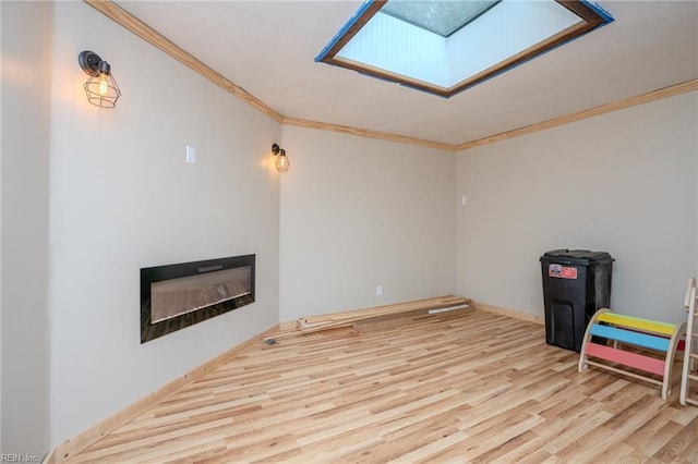 living room featuring light hardwood / wood-style flooring and ornamental molding