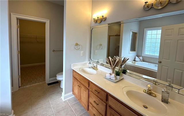 full bathroom featuring tile patterned floors, vanity, toilet, and plus walk in shower