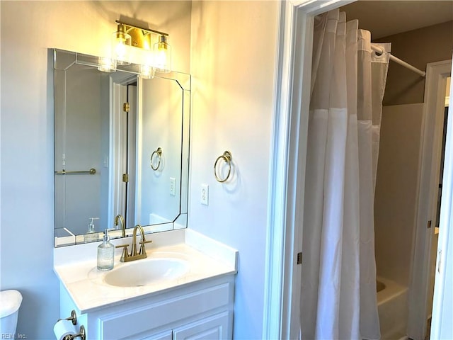 bathroom with shower / bath combo with shower curtain and vanity