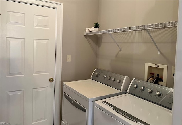 laundry area with washer and clothes dryer