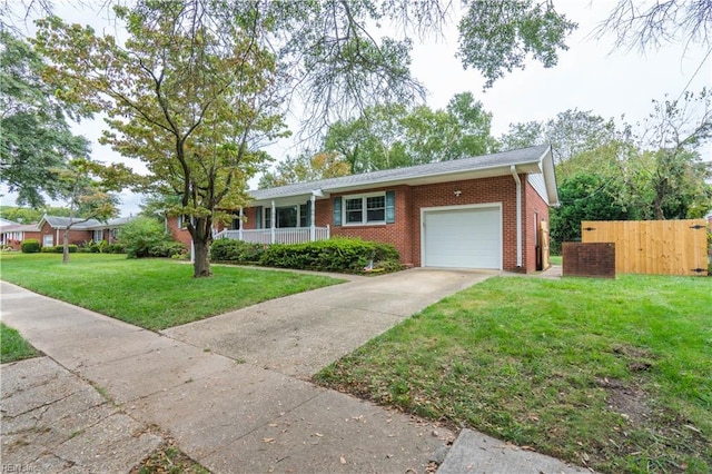 single story home featuring a garage and a front lawn