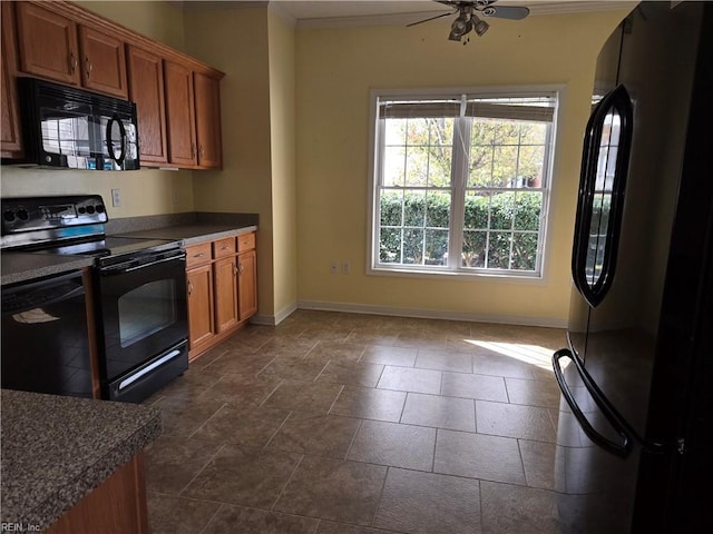 kitchen featuring ceiling fan and black appliances