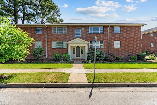 view of front of house featuring a front lawn