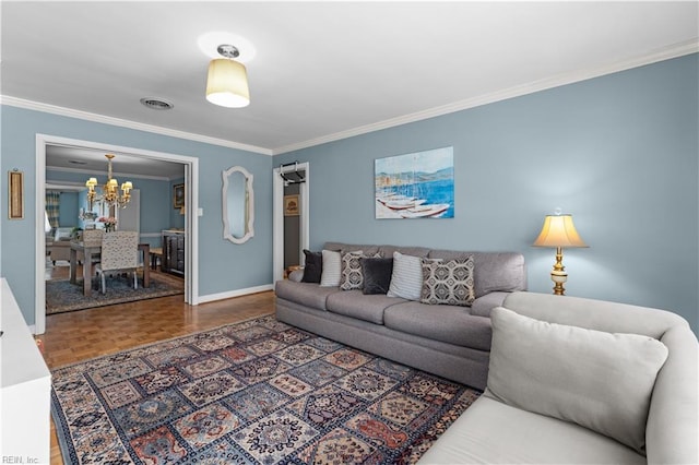 living room featuring a chandelier, parquet floors, and ornamental molding