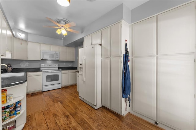 kitchen featuring white cabinets, ceiling fan, white appliances, and light hardwood / wood-style flooring