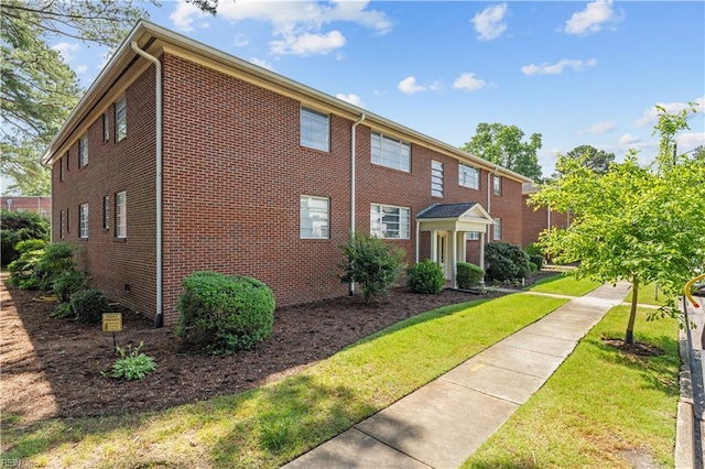 exterior space featuring a yard