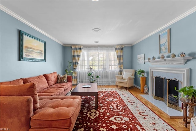 living room with crown molding and light parquet floors