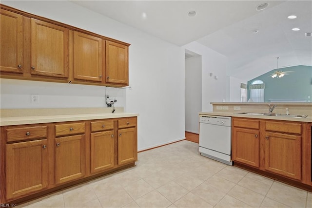 kitchen with ceiling fan, sink, white dishwasher, lofted ceiling, and light tile patterned flooring