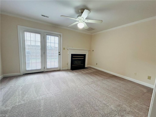 unfurnished living room with light carpet, ornamental molding, a fireplace with flush hearth, and baseboards