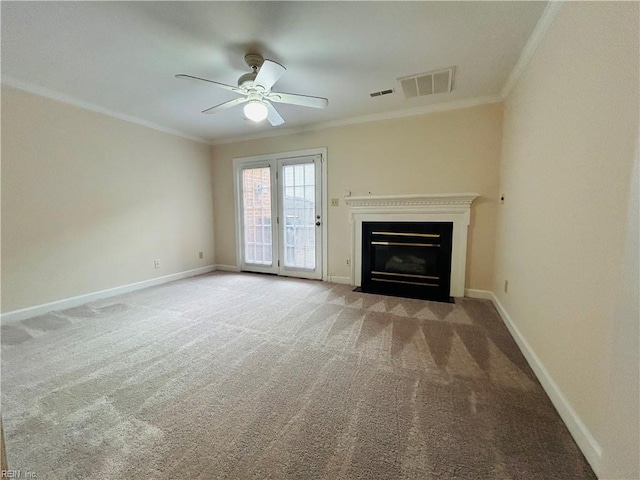 unfurnished living room with light carpet, baseboards, visible vents, and crown molding