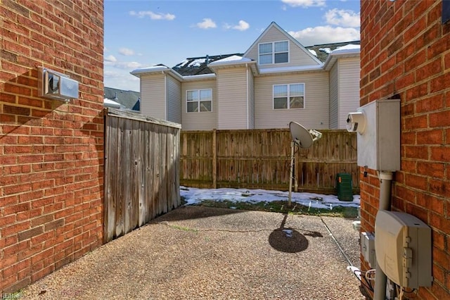 view of patio / terrace featuring fence