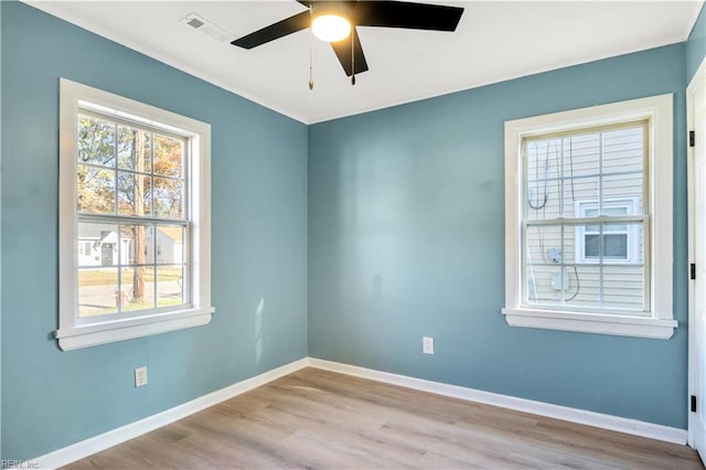 unfurnished room with light hardwood / wood-style floors and ceiling fan