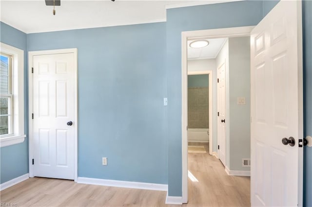 unfurnished bedroom featuring light hardwood / wood-style floors