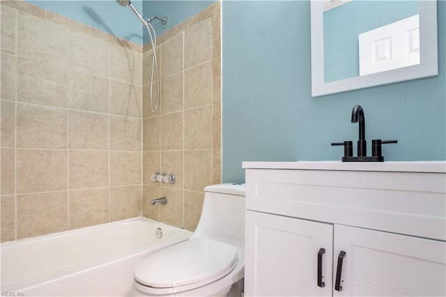 full bathroom with vanity, toilet, and tiled shower / bath combo